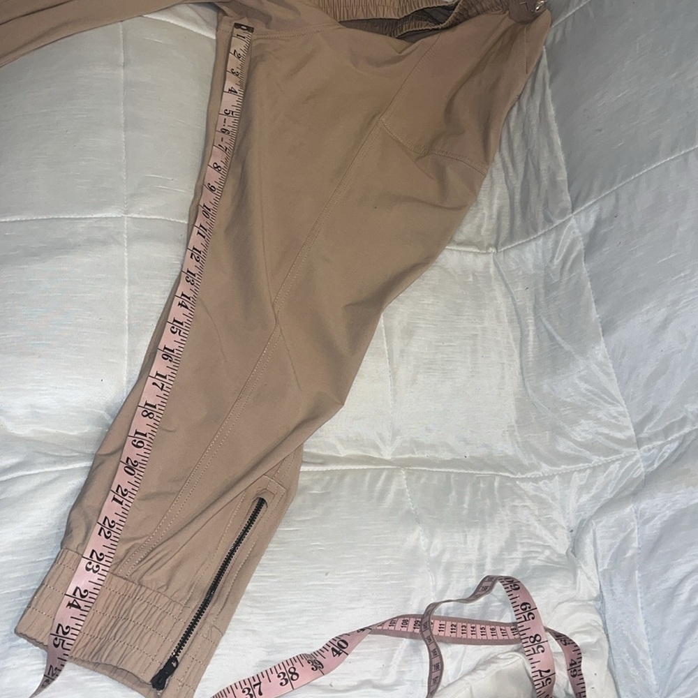 Calia by Carrie Underwood Nyluxe Joggers Pale Pink Size Small Zip Ankle - Picture 14 of 15